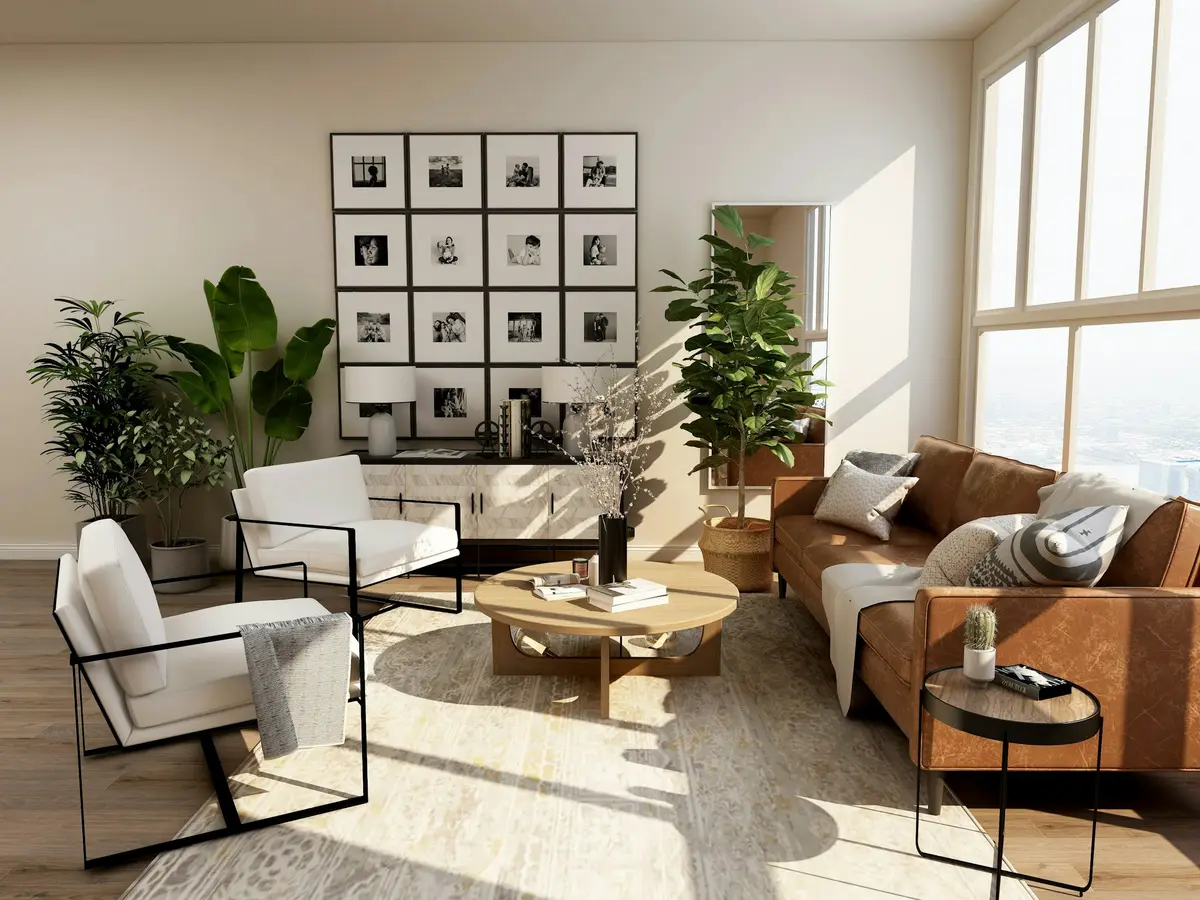 A styled living room with a gallery wall and leather sofa